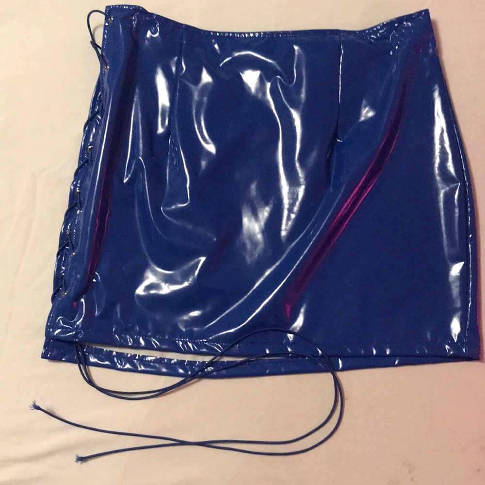 Skirt TrueStatements cut out string. Very Sexy Party skirt fits a 30-32 waist